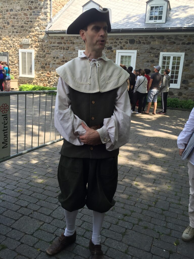 A volunteer portrays Jacques Le Ber, brother-in-law of Michel Messier and Anne LeMoyne.