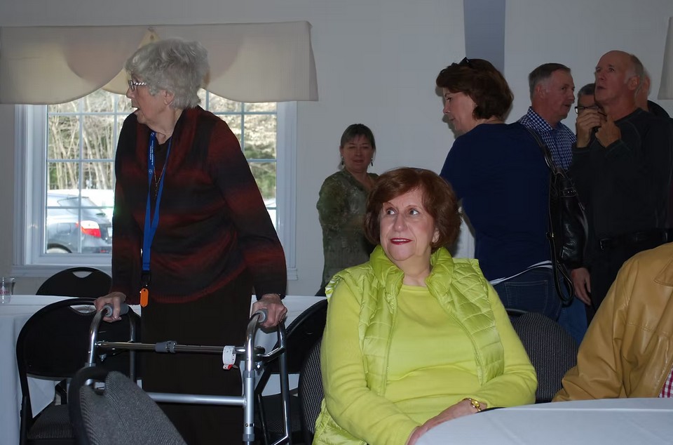 The participants are preparing to move to another room.