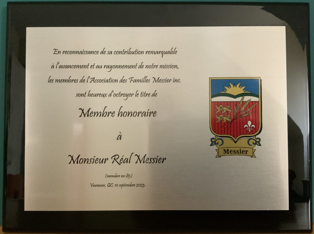The commemorative plaque presented to Réal.